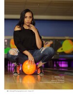 woman crouched with a bowling ball at a retro bowling alley portrait photography