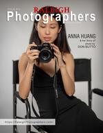 woman holding a camera in a studio chair cover portrait photography