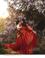 mother and daughter among wisteria blossoms portrait photography