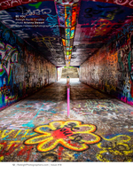 graffiti-covered pedestrian tunnel cityscape photography