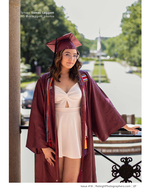 graduate in cap and gown on a college walkway senior portrait photography