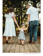 family walking hand in hand on a brick path family photography