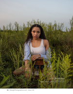 woman seated in tall grass at dusk portrait photography