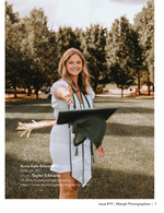 graduate tossing her cap in a park graduation portrait photography