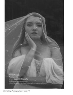 black and white bridal portrait beneath a pearl-studded veil bridal photography